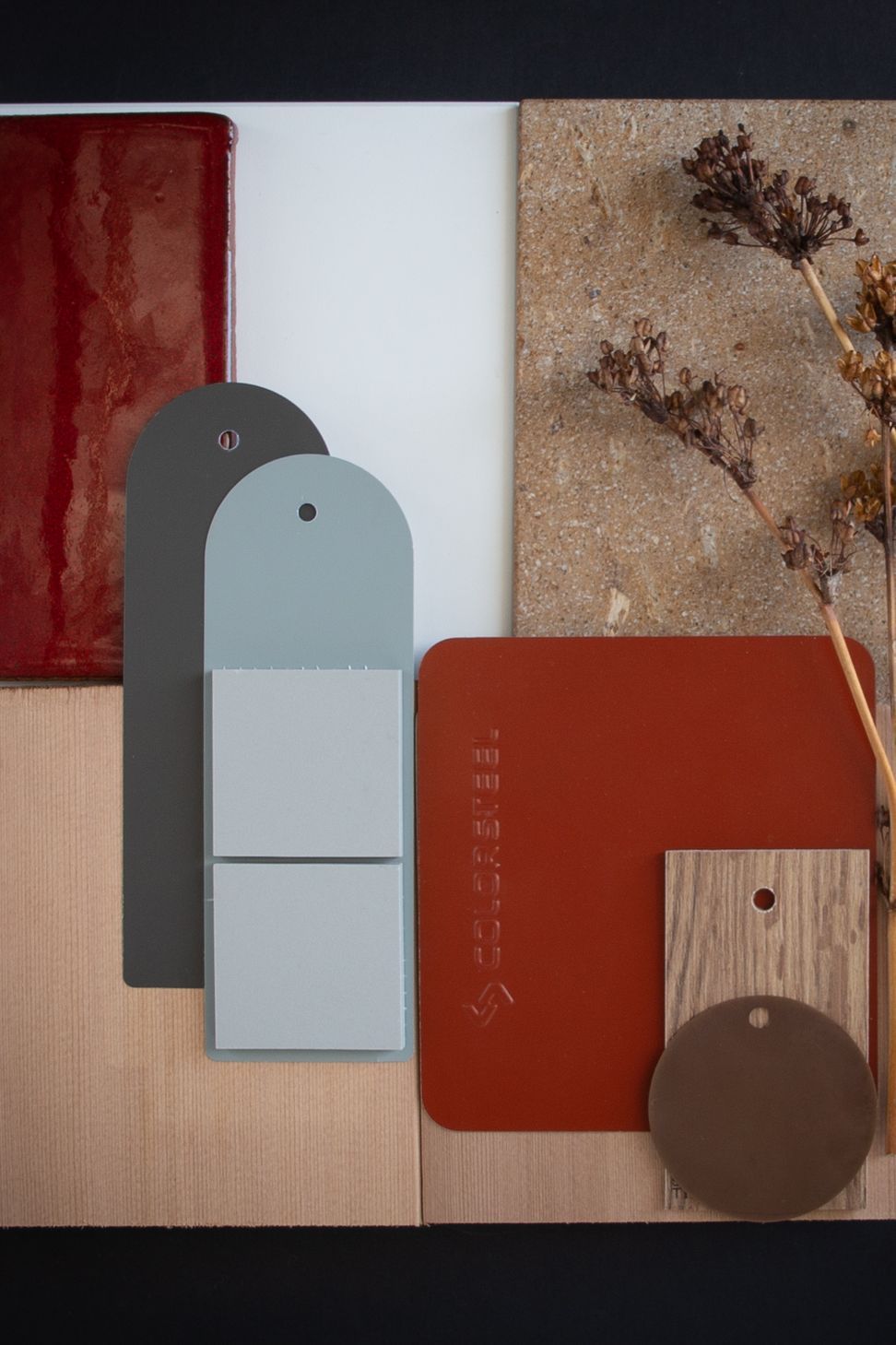 Colour: Pioneer Red is a bold warm red, it can be used many ways: as accents, for the roof, or for the entire house. In this option we designed a house where the strength of the colour feels right at home when paired with the warm tones of NZ Hinuera stone, cedar, NZ handmade tiles and set against autumn foliage.