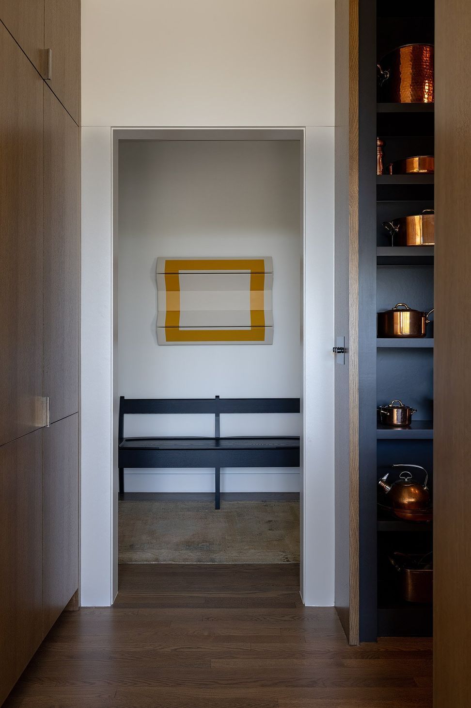 11RollingWoodCuppettKilpatrickArchitectureandInteriorDesignaustin-design-firm-minimalist-hallway-with-art-and-bench.jpg
