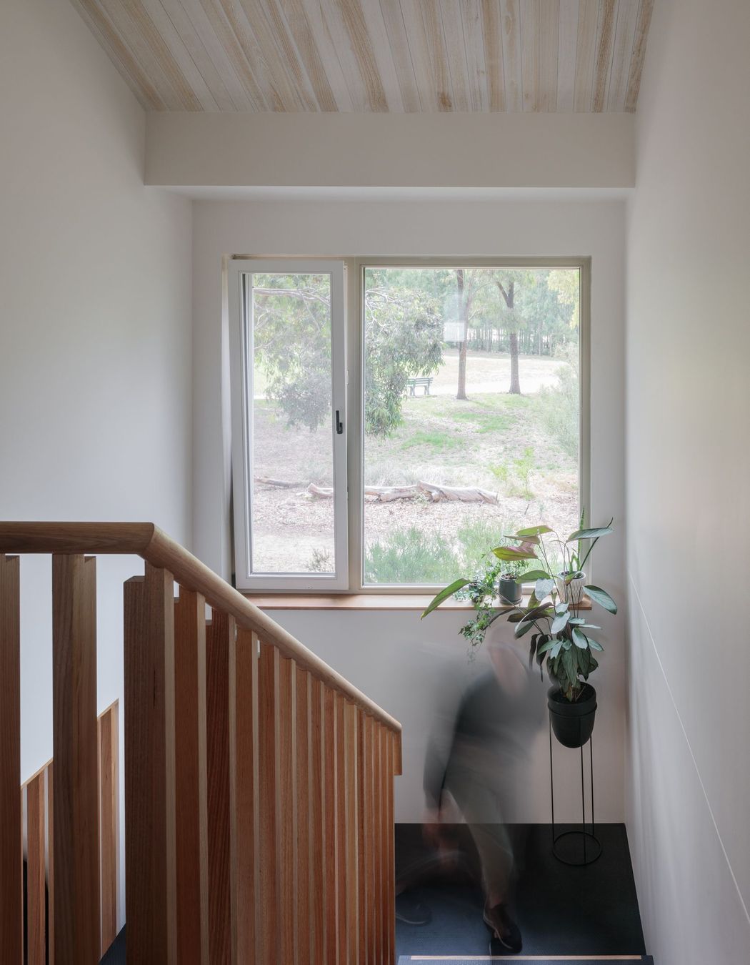 Staircase window with bi-fold opening, bringing in light and air