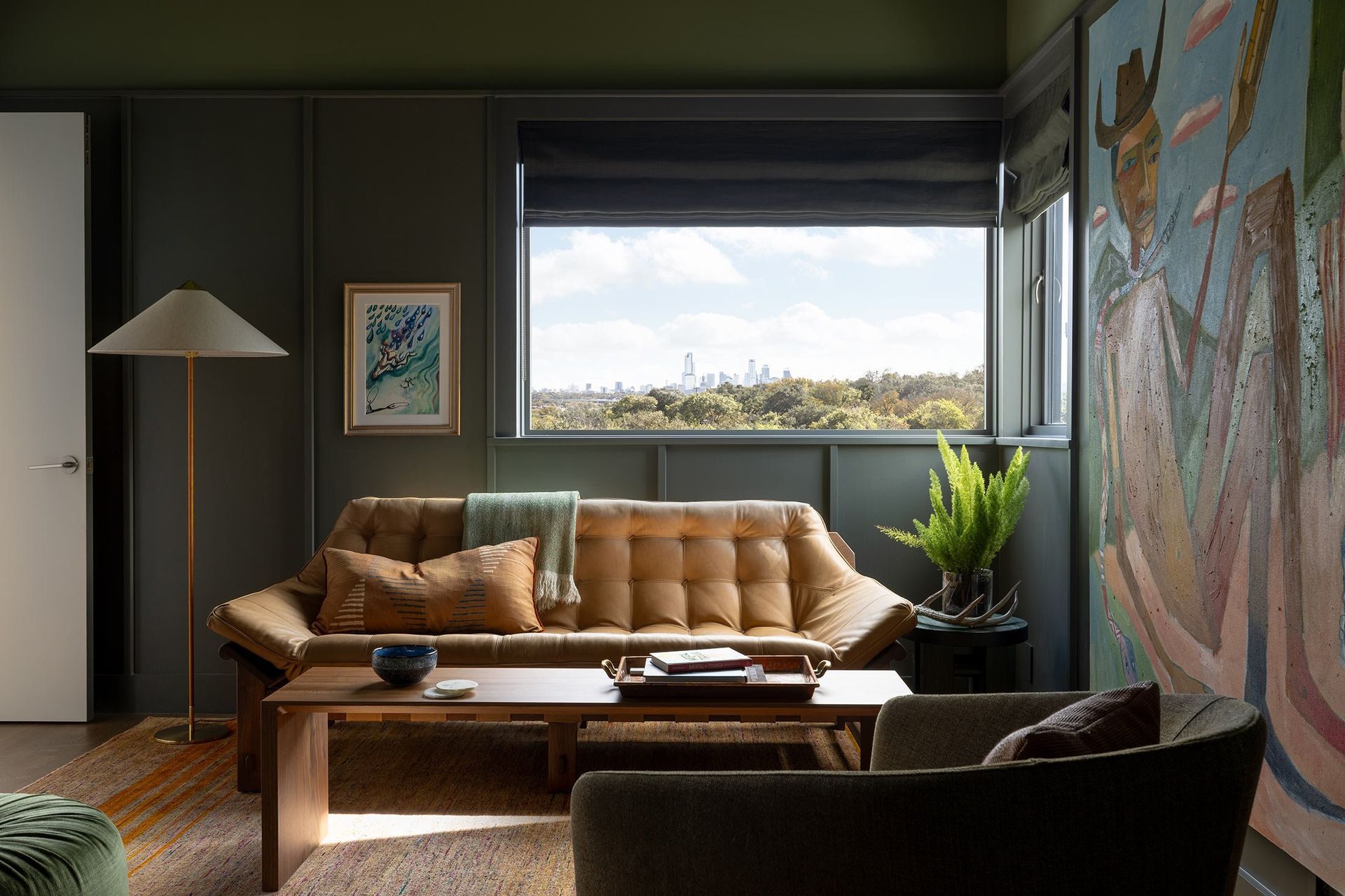 13RollingWoodCuppettKilpatrickArchitectureandInteriorDesignsophisticated-living-room-design-leather-sofa-urban-view.jpg