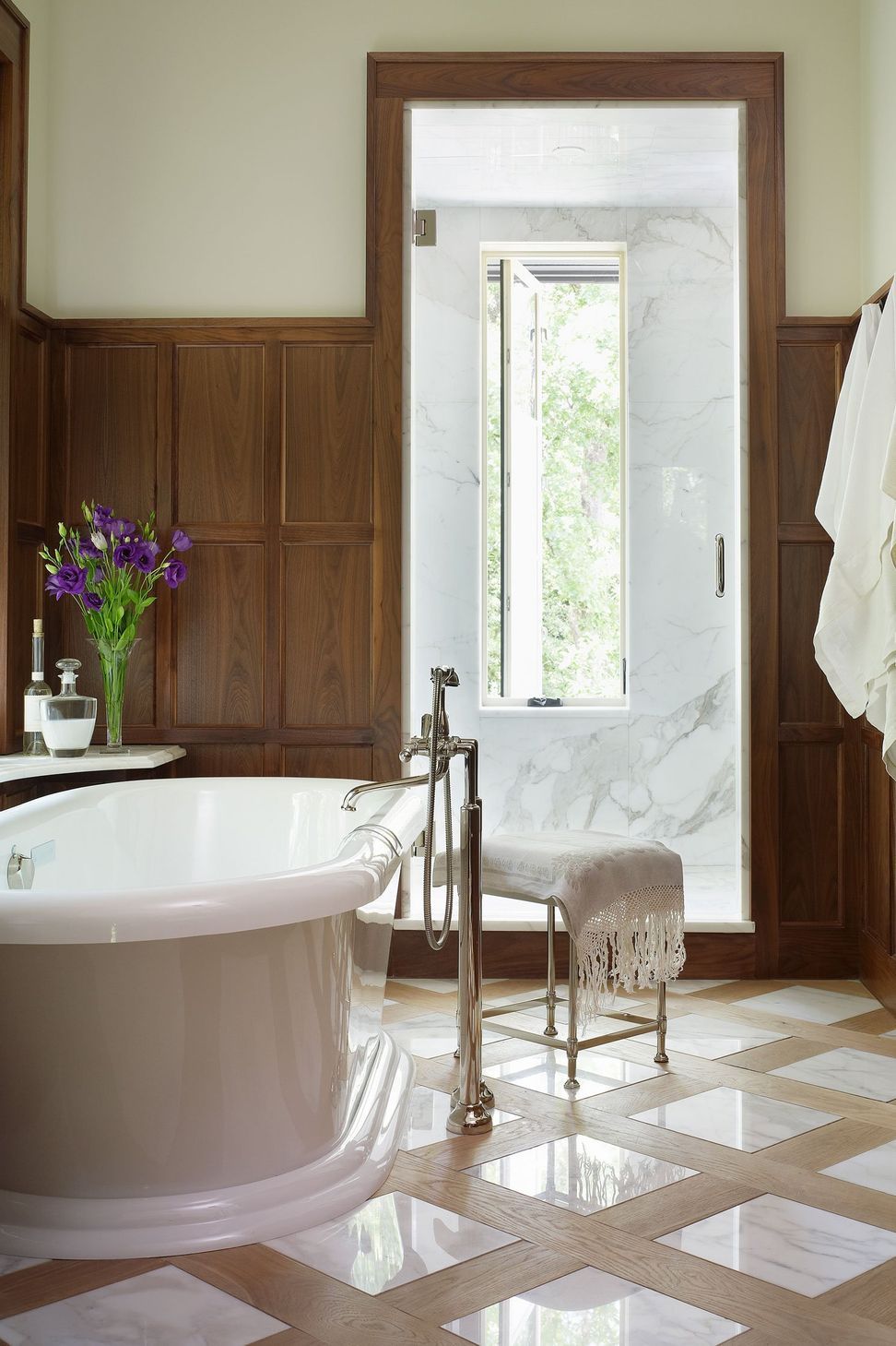 16UrbanHomesteadCuppettKilpatrickArchitectureandInteriorDesignaustin-tx-main-bath-wood-paneling-shower.jpg