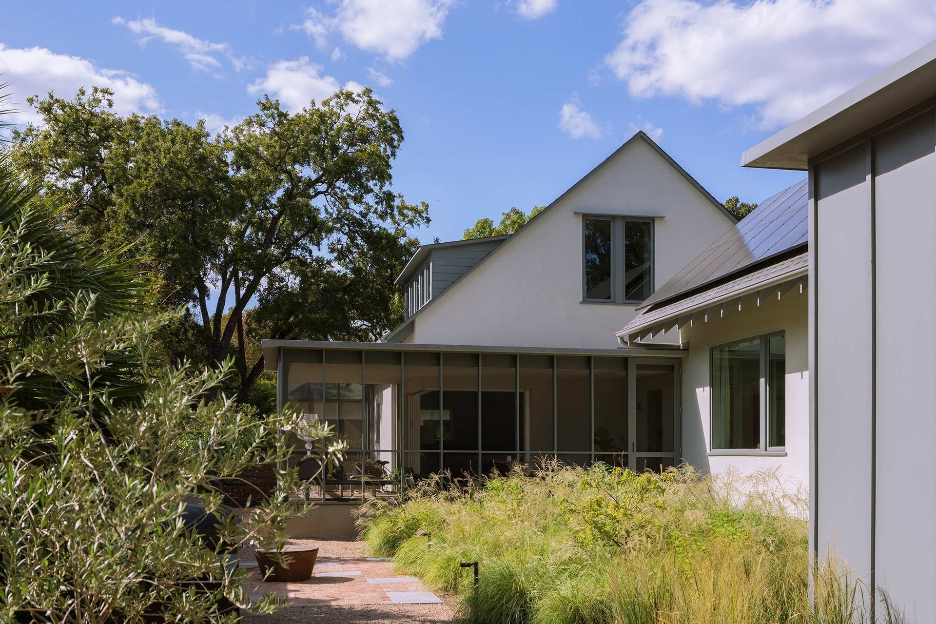 17ClarksvilleInfillCuppettKilpatrickArchitectureandInteriorDesignmodern-home-gabled-roof-landscaping.jpg