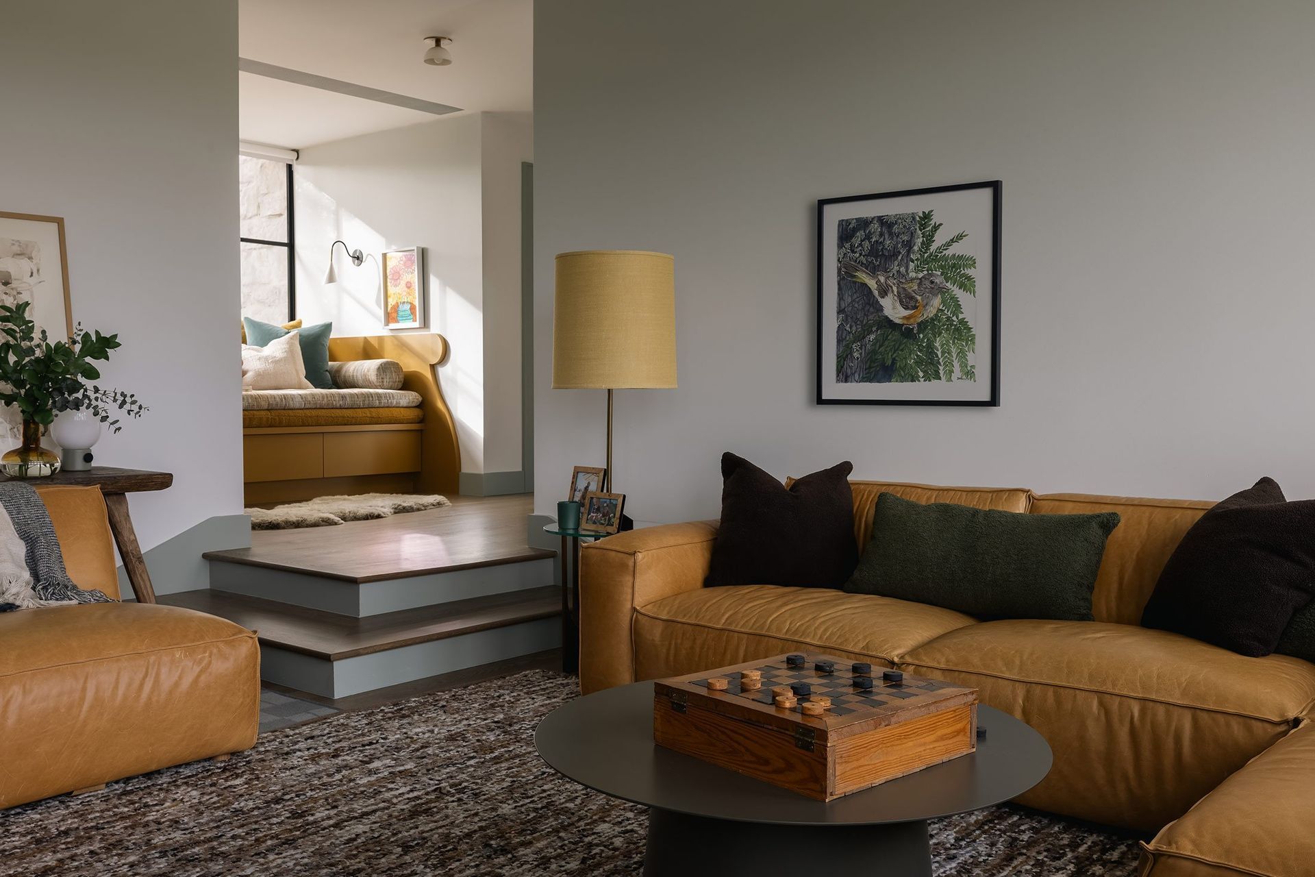 18RollingWoodCuppettKilpatrickArchitectureandInteriorDesignleather-sectional-family-room-design.jpg