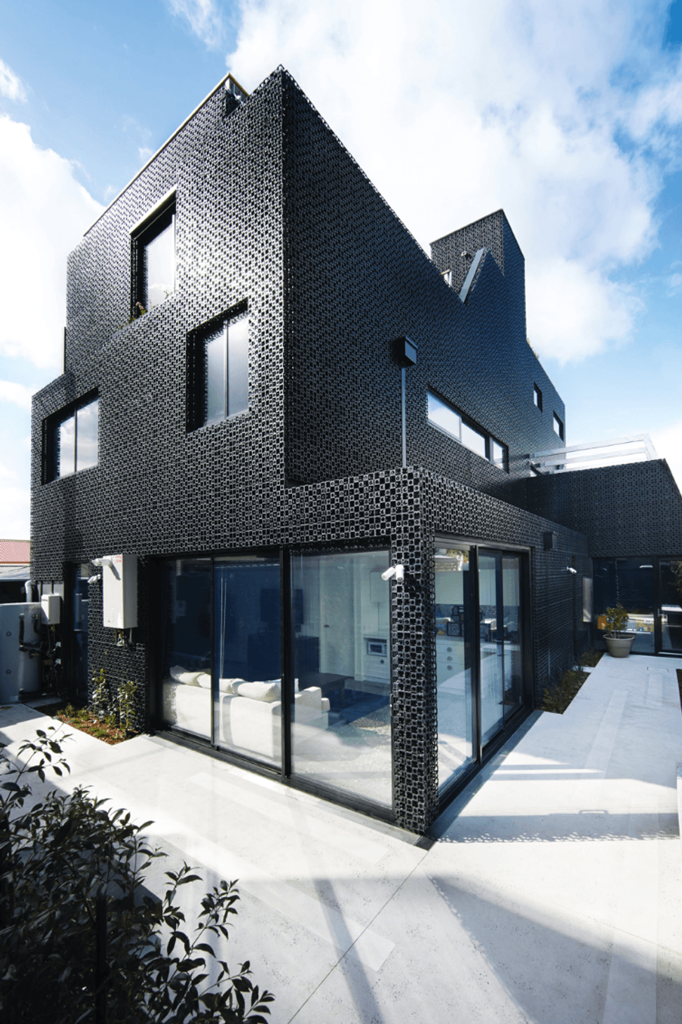 2AdvancedLifestyleSolutionsbackyardpatiorearofhouse.png