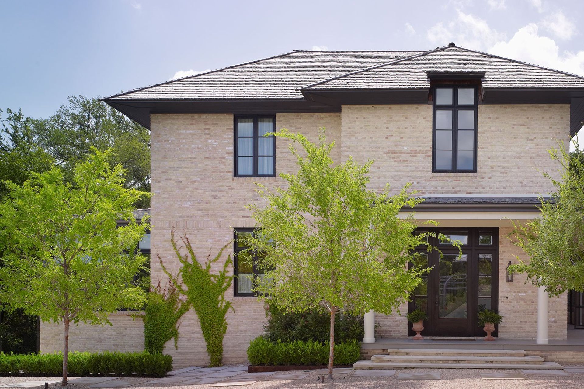 2UrbanHomesteadCuppettKilpatrickArchitectureandInteriorDesignaustin-tx-classic-brick-home-slate-roof.jpg