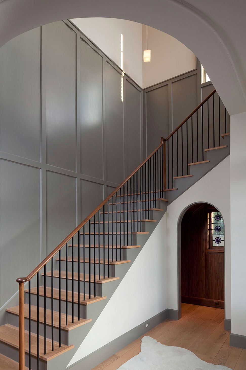 5UrbanHomesteadCuppettKilpatrickArchitectureandInteriorDesignaustin-tx-staircase-view-wainscot-paneling-wood.jpg