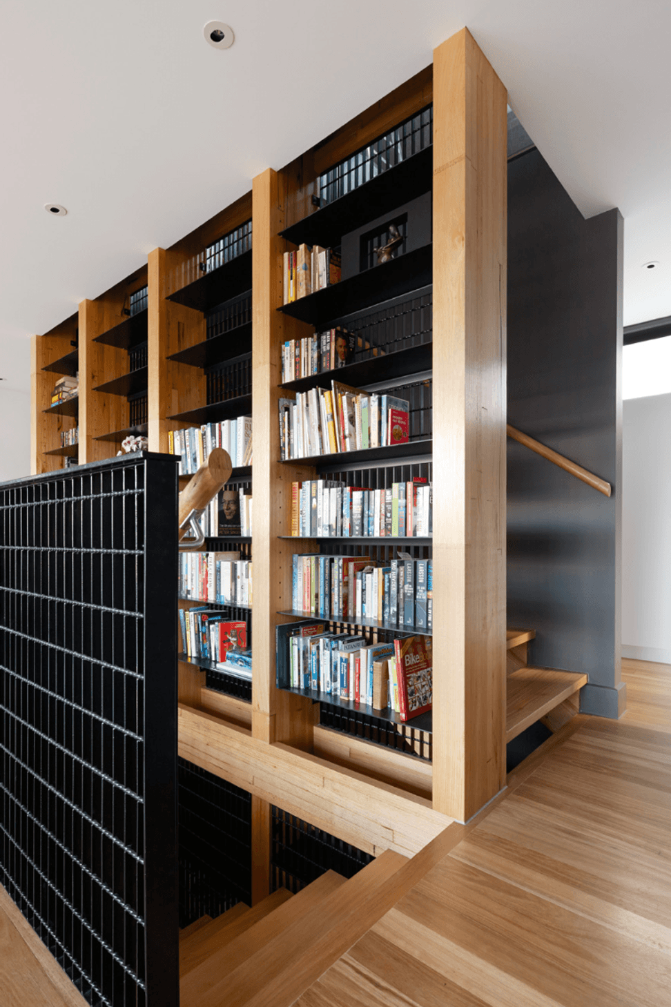 7AdvancedLifestyleSolutionsbookcasestaircasestairwell.png