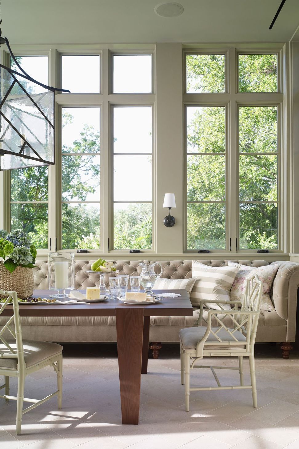 9UrbanHomesteadCuppettKilpatrickArchitectureandInteriorDesignaustin-tx-dining-room-custom-bench-couch-large-windows.jpg