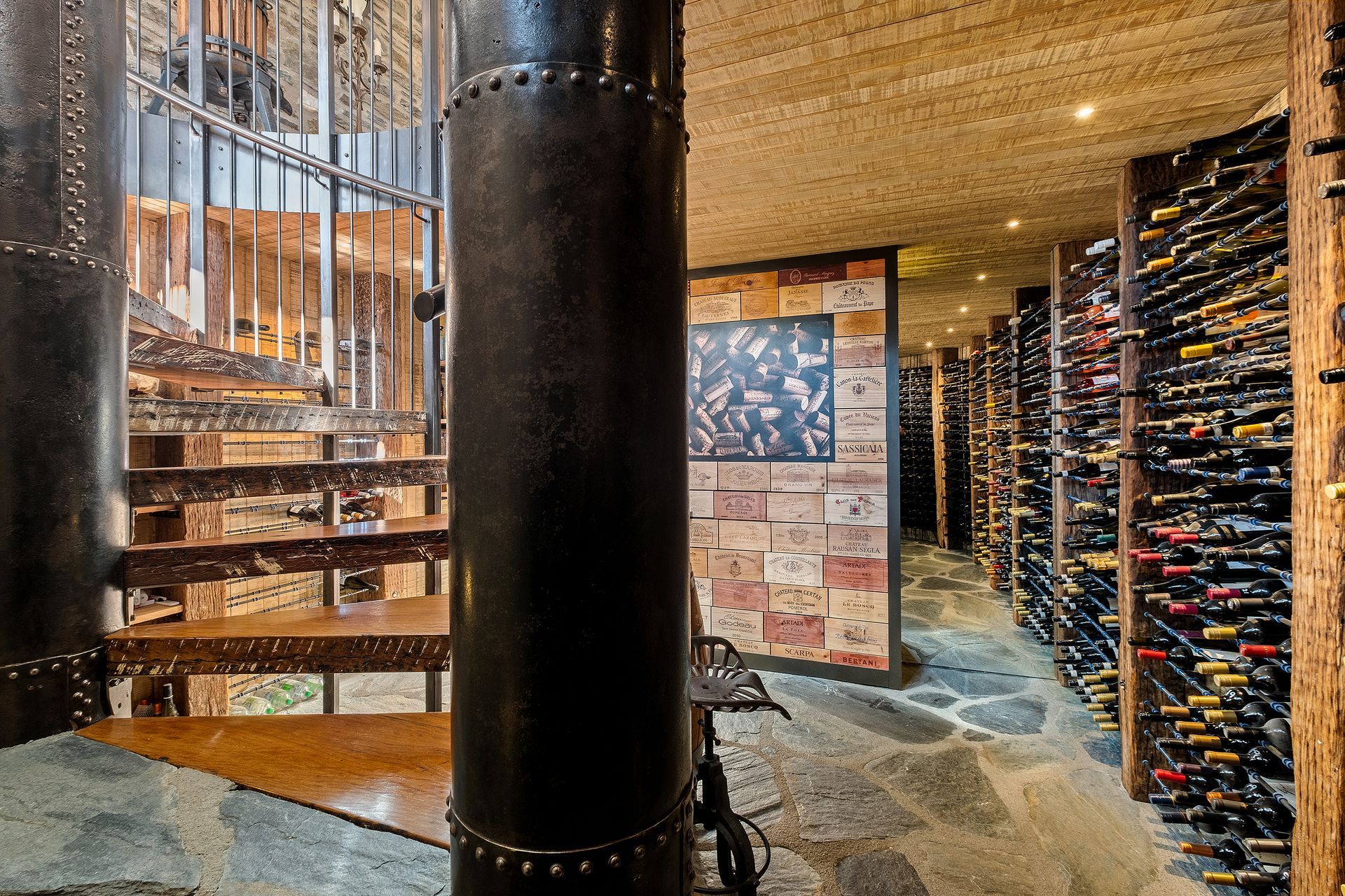 Bespoke staircase, with up-cycled timber treads and pillars created from steel irrigation pipes. Masterpiece!