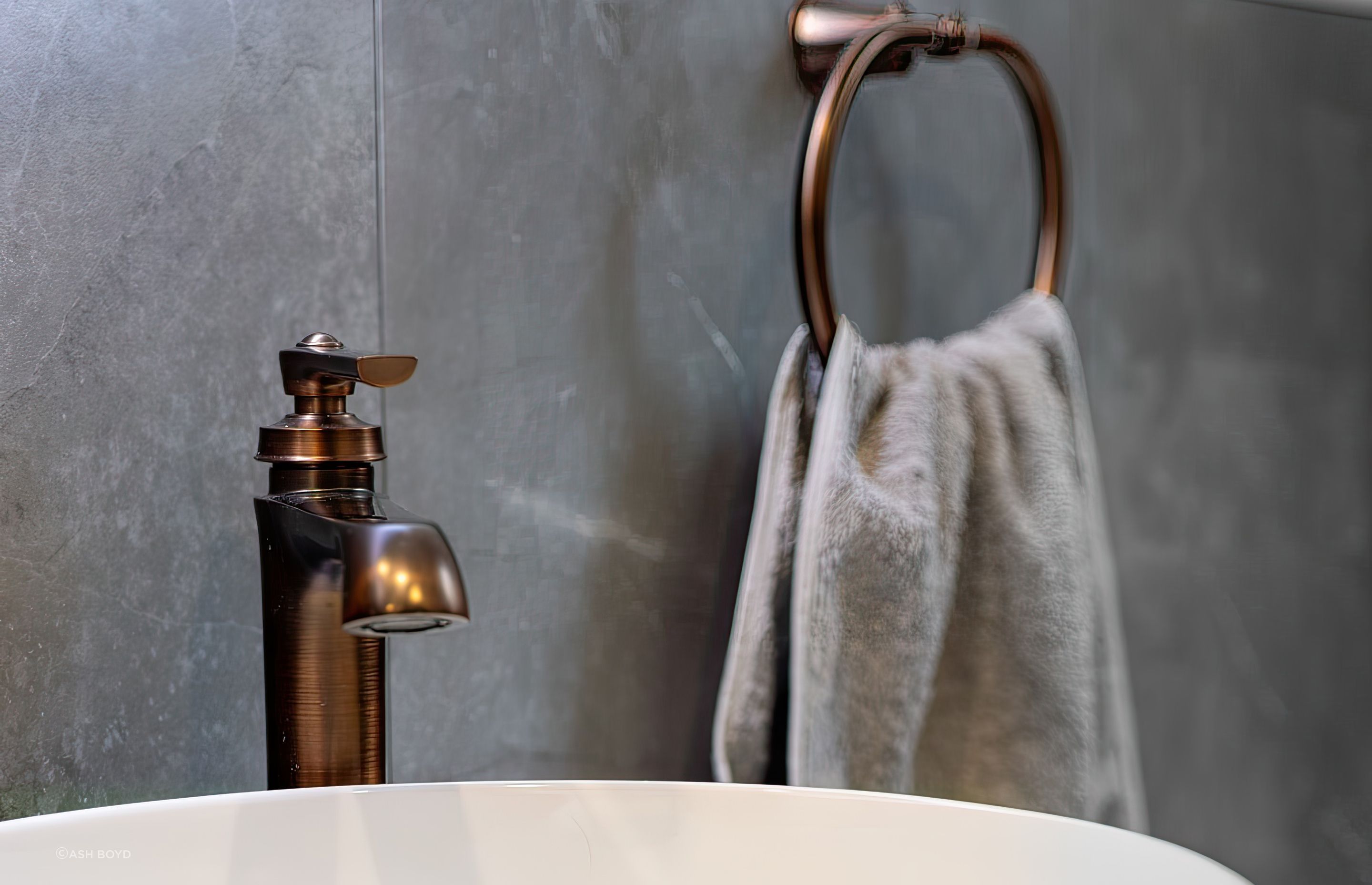 Old-and-new-brass-faucet-ovr-modern-basin-arcline-architecture-topaz-very-compressed-2x.jpeg