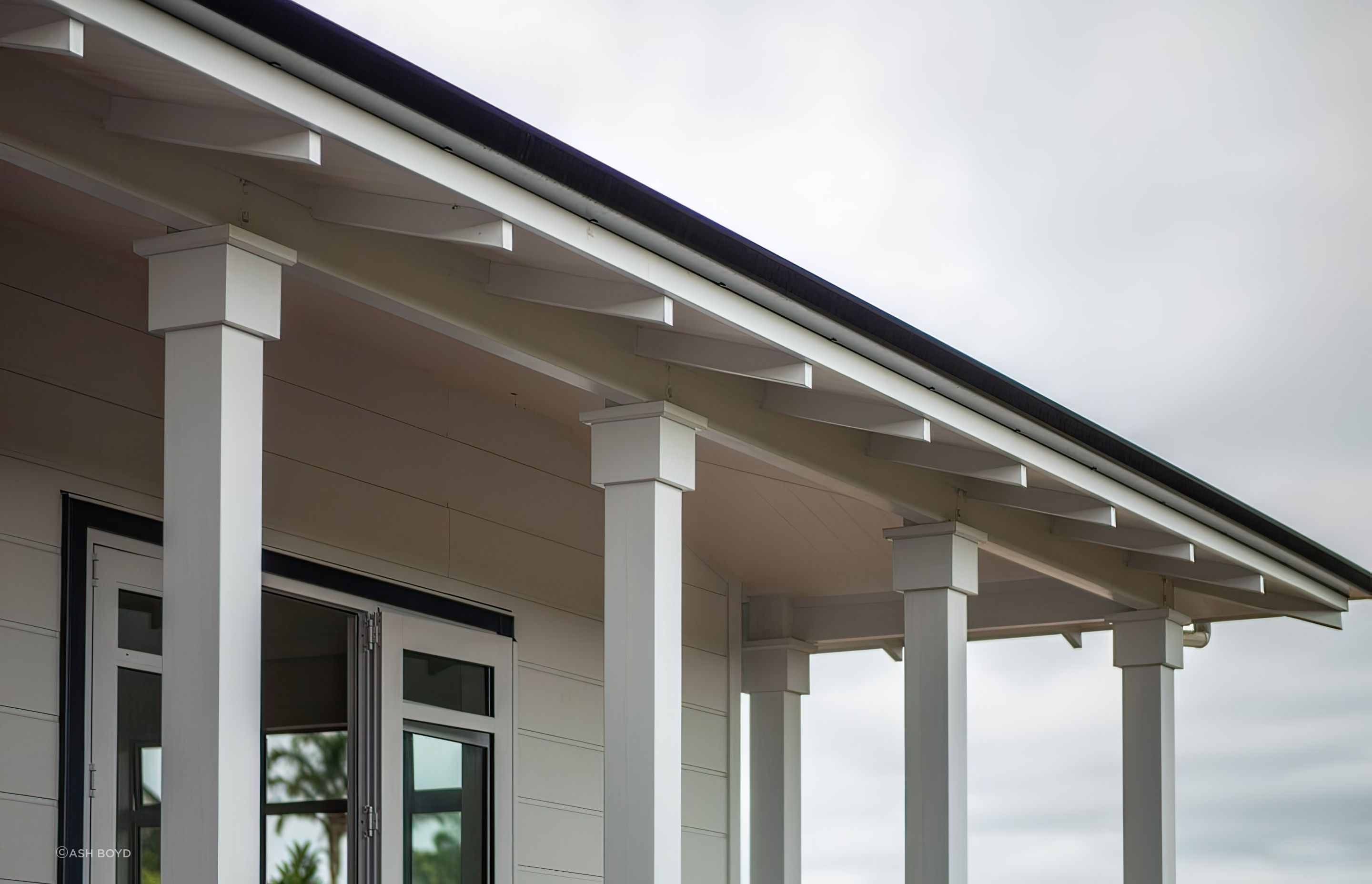 Verandah-raking-ceiling-exposed-rafters-arcline-architecture-topaz-very-compressed-2x.jpeg