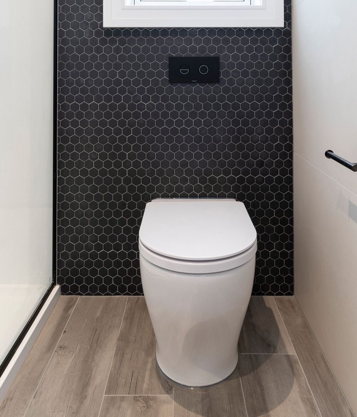 Amber Grey 200x1200mm porcelain, Urban Cement White Alyssum 600x1200mm and Beton Still Black Swan Hex mosaic wall