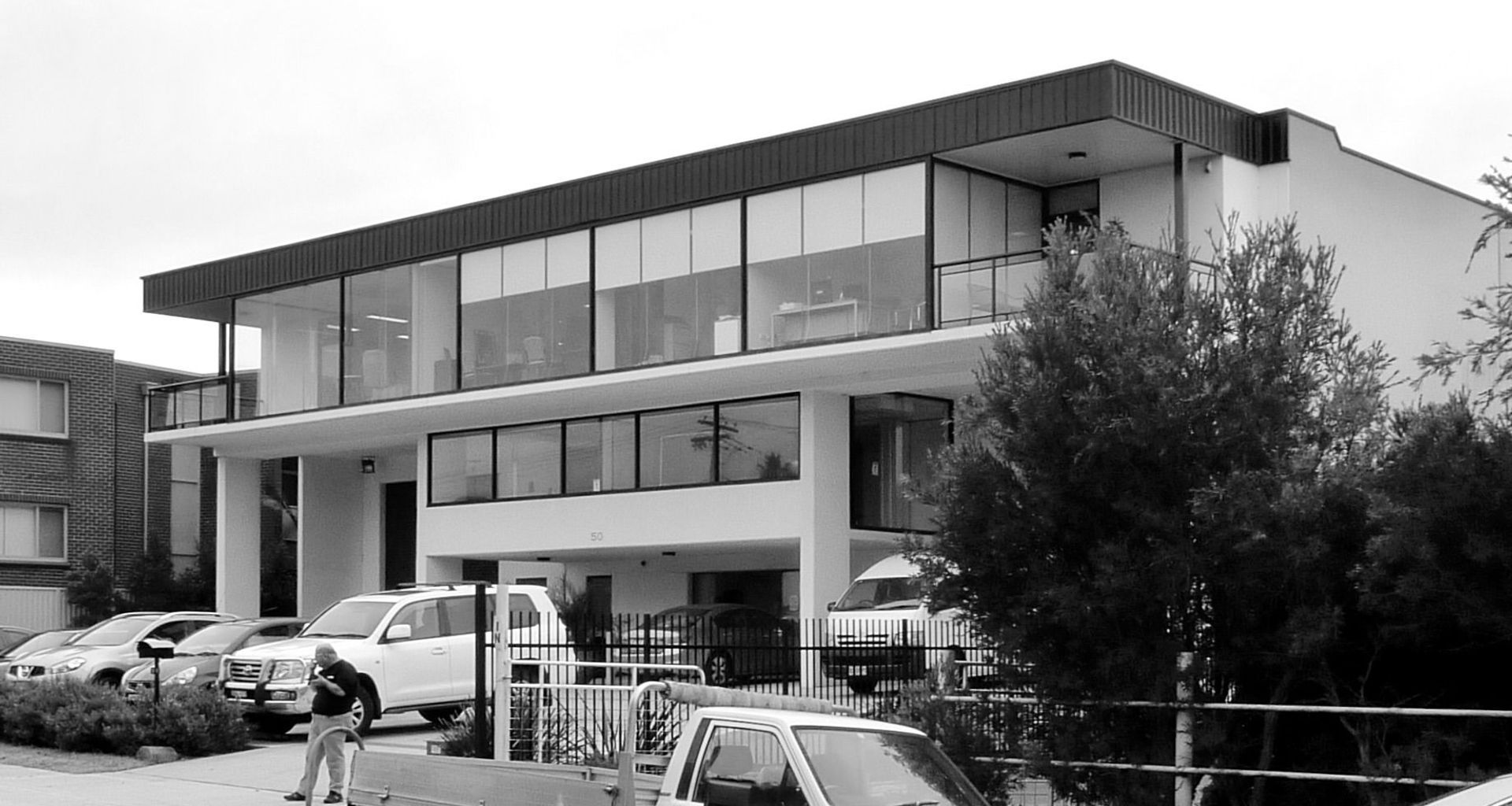 Tri-level planning provides a large open plan office area to the upper floor with outdoor breakout spaces with views over the garden centre, accessible by a lift. A mid level office works welll as a dispatch office area, with staff facilities under, as well as providing a space for a high bay roller shutter each side. Parking and on-site turning all incorporated into the front setback.