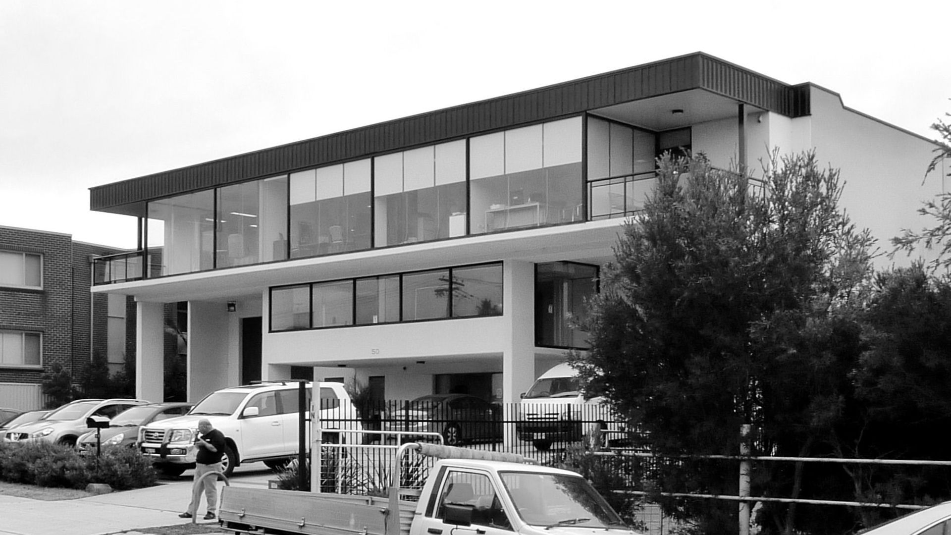 Tri-level planning provides a large open plan office area to the upper floor with outdoor breakout spaces with views over the garden centre, accessible by a lift. A mid level office works welll as a dispatch office area, with staff facilities under, as well as providing a space for a high bay roller shutter each side. Parking and on-site turning all incorporated into the front setback.