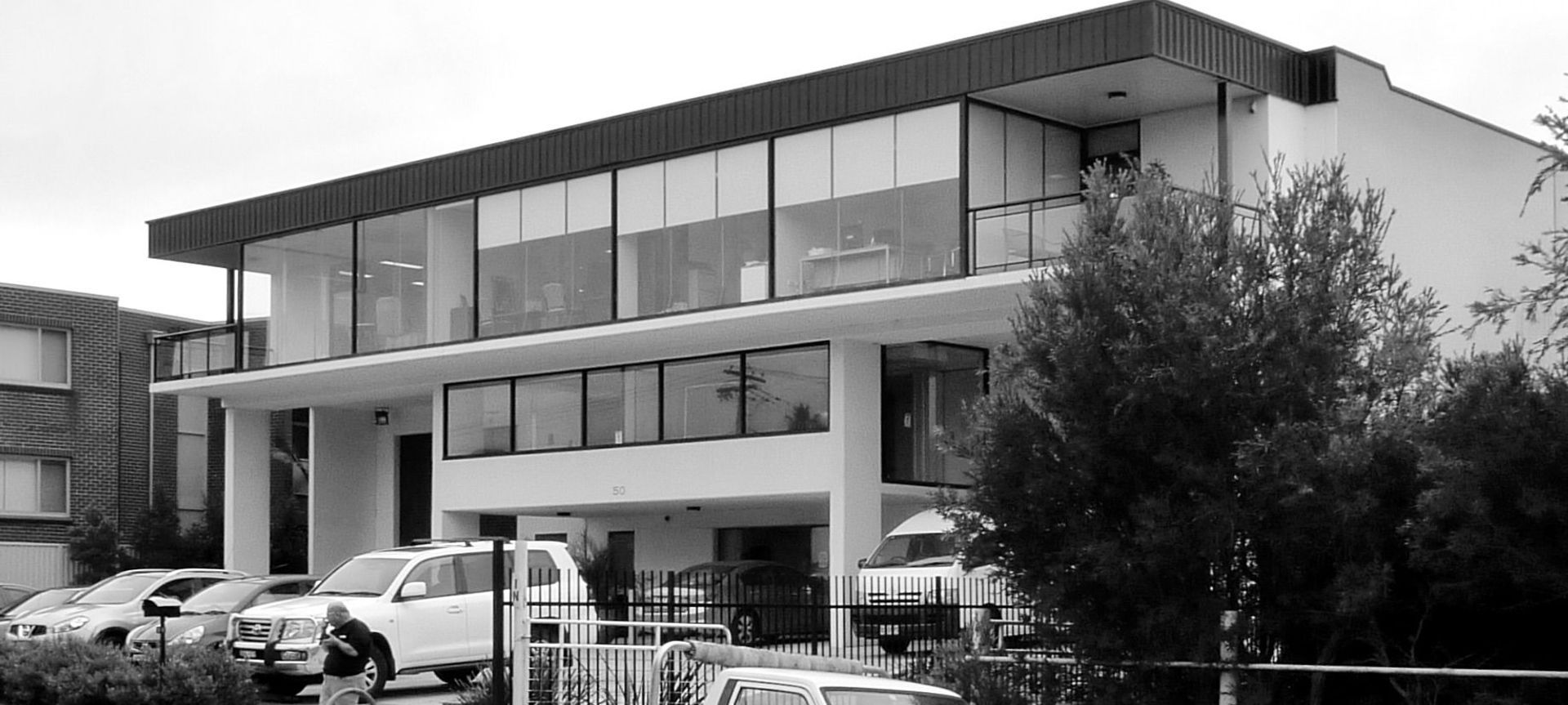 Tri-level planning provides a large open plan office area to the upper floor with outdoor breakout spaces with views over the garden centre, accessible by a lift. A mid level office works welll as a dispatch office area, with staff facilities under, as well as providing a space for a high bay roller shutter each side. Parking and on-site turning all incorporated into the front setback.