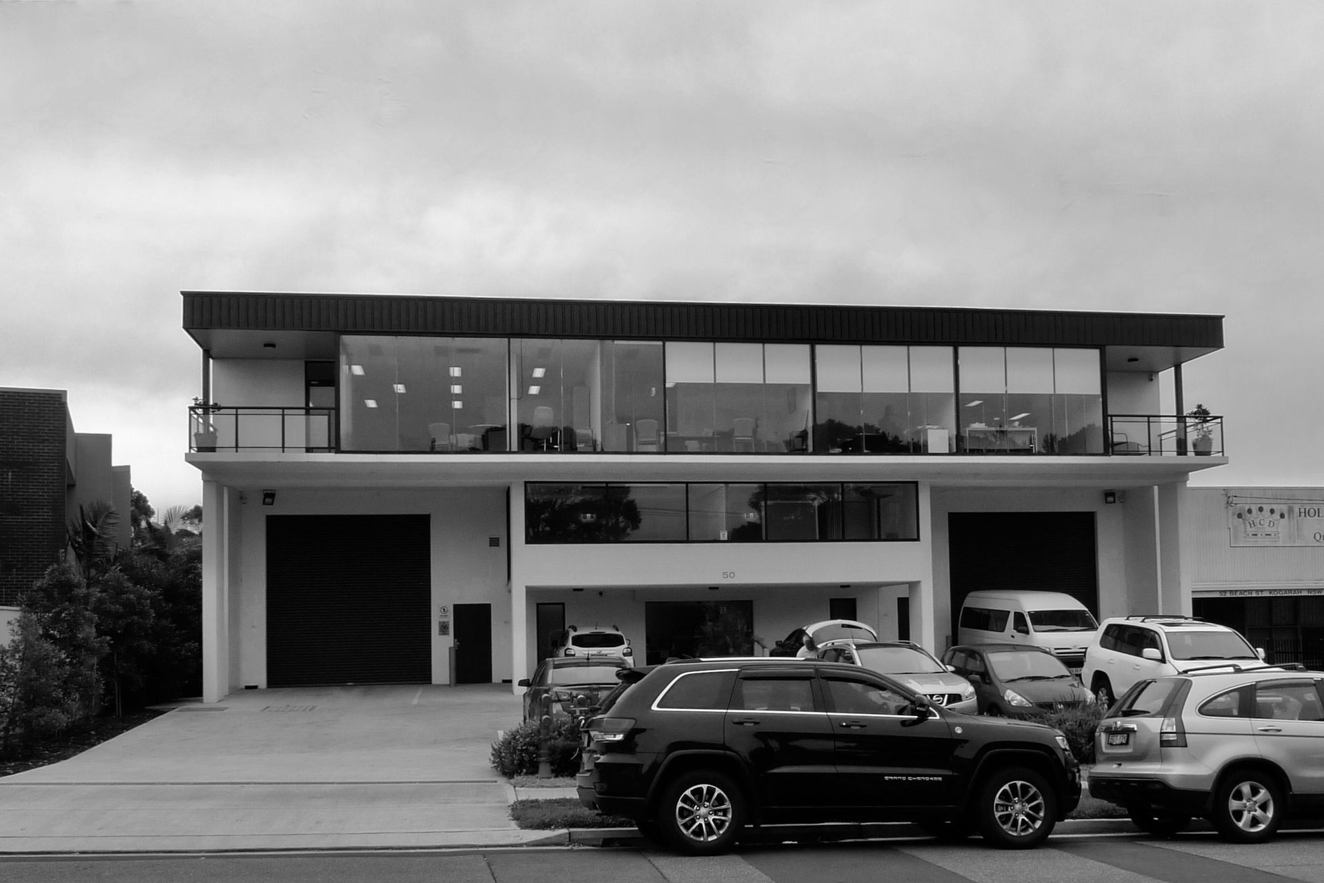 Elegant stepped facade elements give the building depth and dimension and self shading. Originally, designed as a two-unit site, it iwas also designed to allow for minor modifications capable of turning it into one tenancy, as it is currently being used