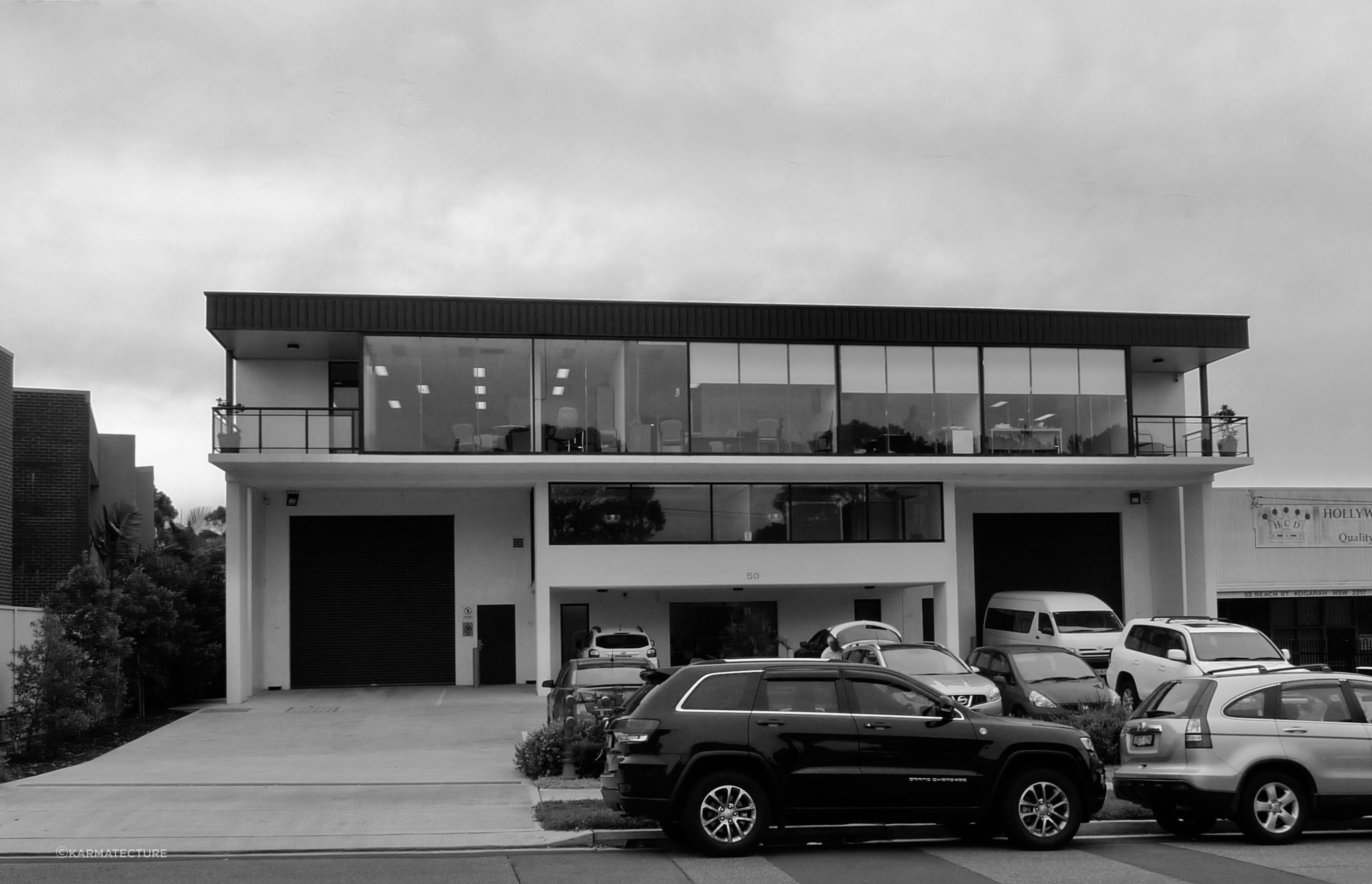 Elegant stepped facade elements give the building depth and dimension and self shading. Originally, designed as a two-unit site, it iwas also designed to allow for minor modifications capable of turning it into one tenancy, as it is currently being used