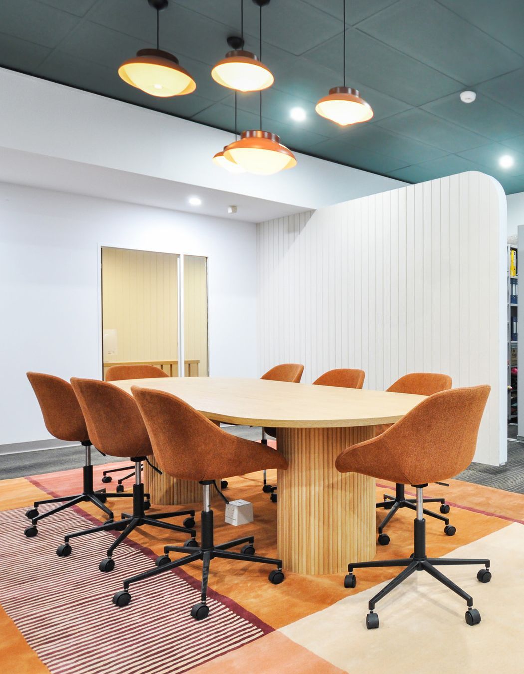 Pictured: Cooper Office Chair and Benjamin Ripple Dining Table