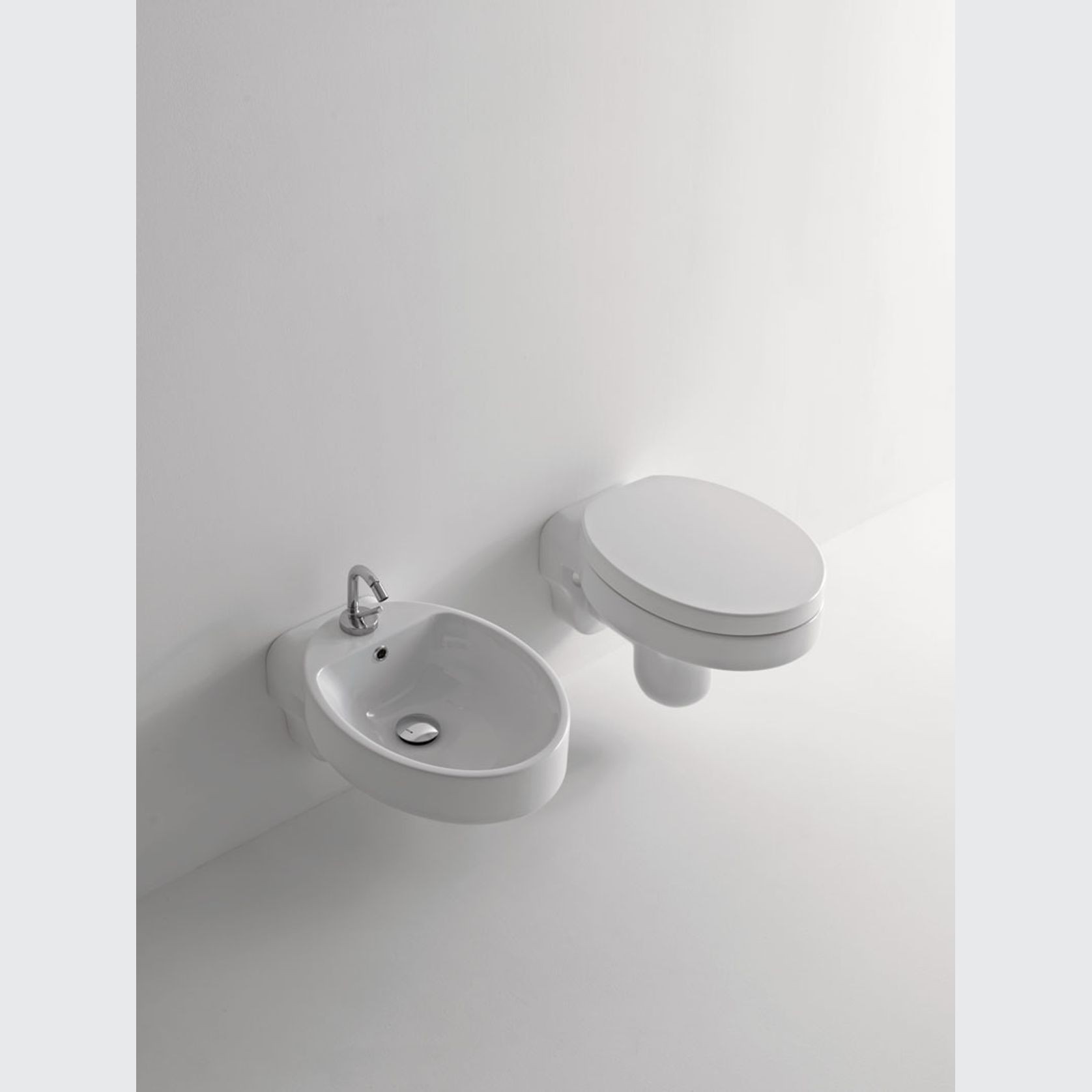 Cento Oval Wall Hung Toilet and Bidet by Kerasan gallery detail image
