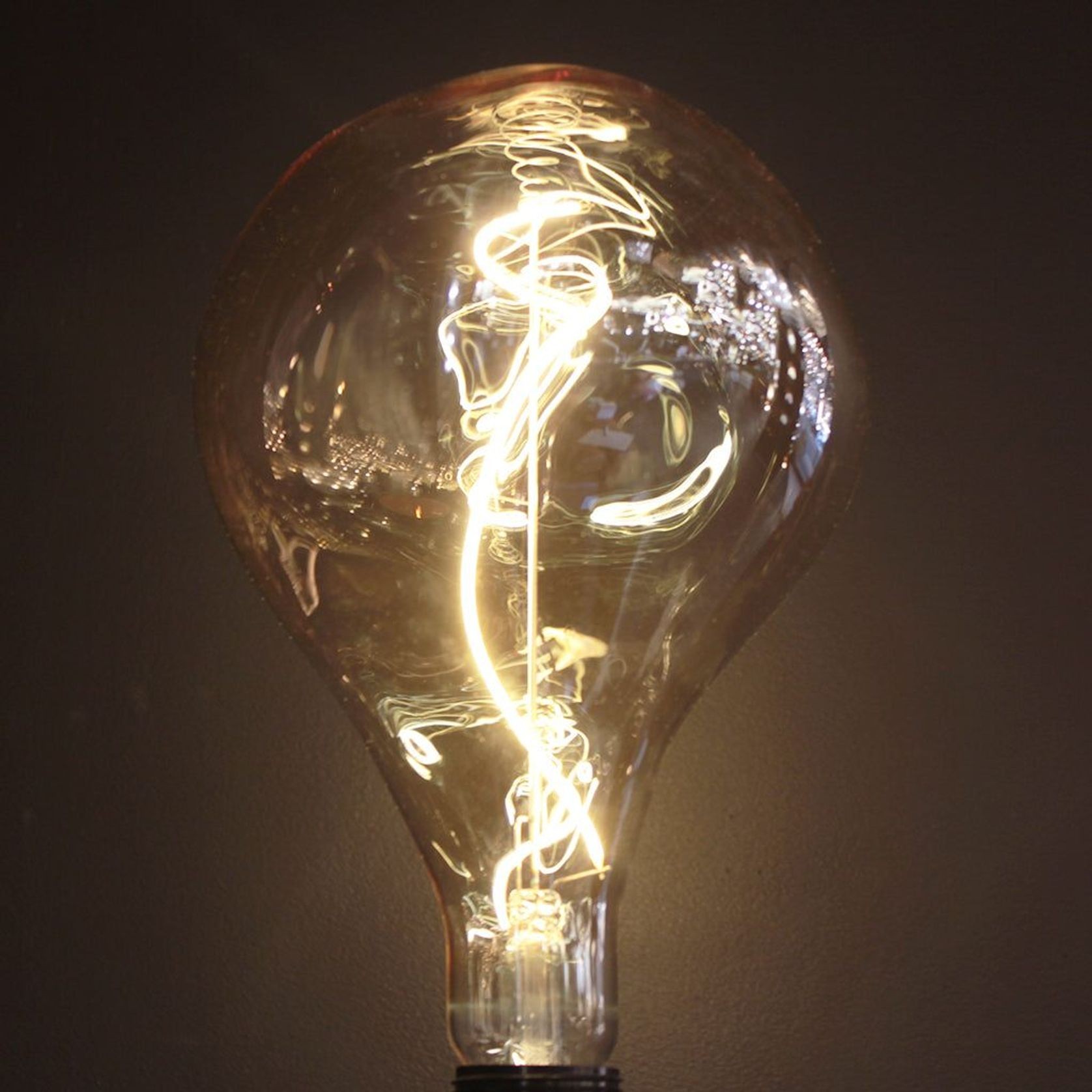 A165 Organic Shape Amber glass E27 Light Bulb gallery detail image