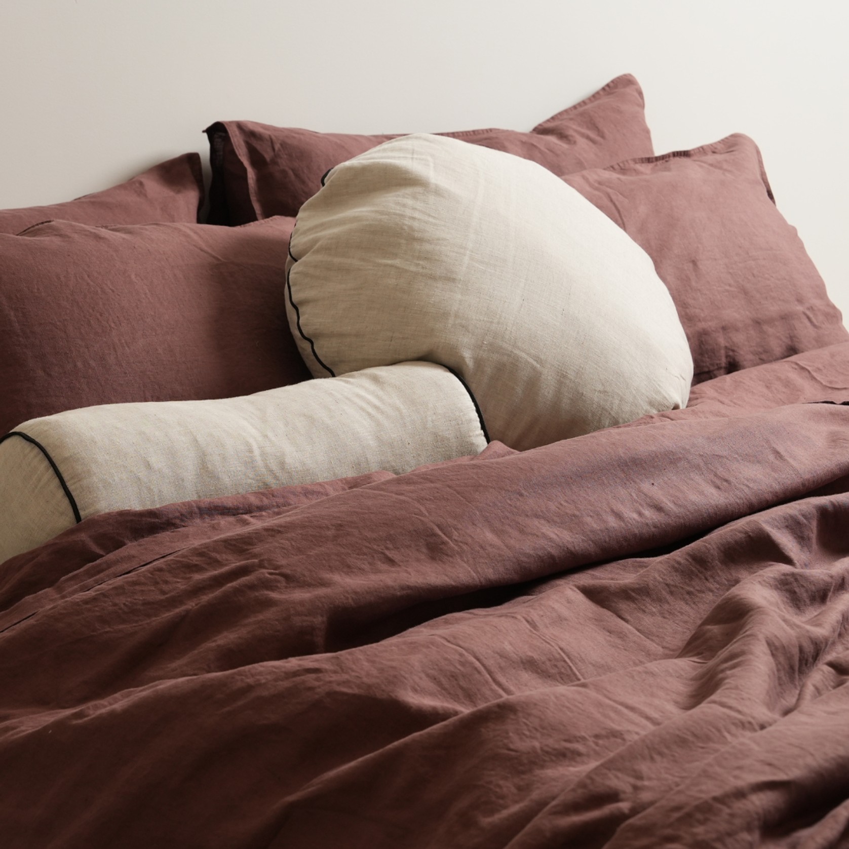 100% French Flax Linen Piped Feather Filled Bolster Cushion- Natural Oat/ Black gallery detail image