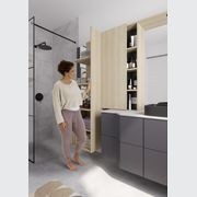 Innovative bathroom storage using an overlay sliding door track