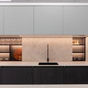 SlideLine M Insert as a hidden storage door in a splashback