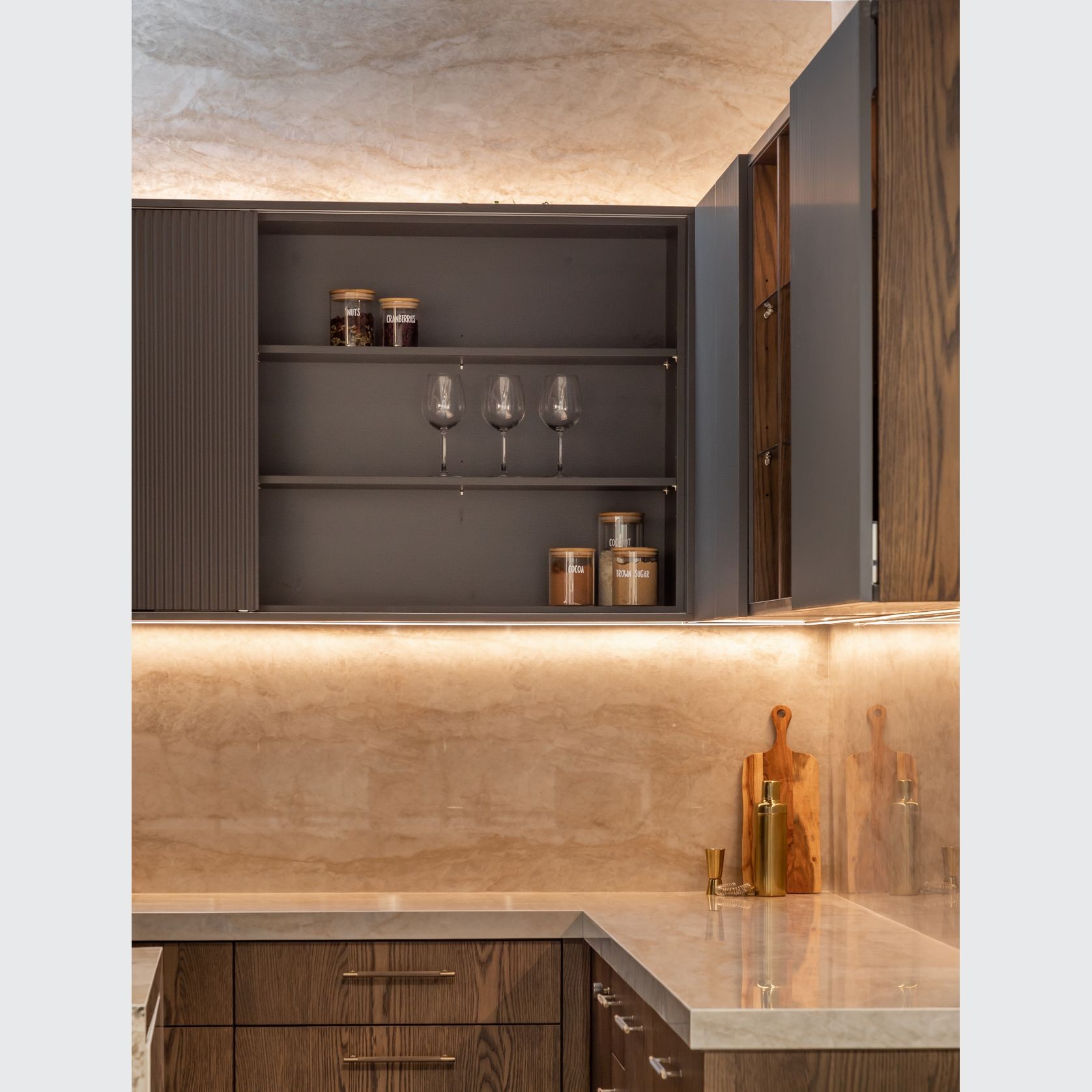 SlideLine M Inset in an overhead cabinet