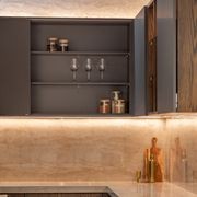 SlideLine M Inset in an overhead cabinet