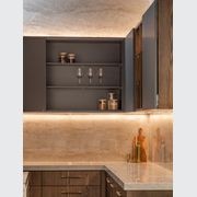 SlideLine M Inset in an overhead cabinet