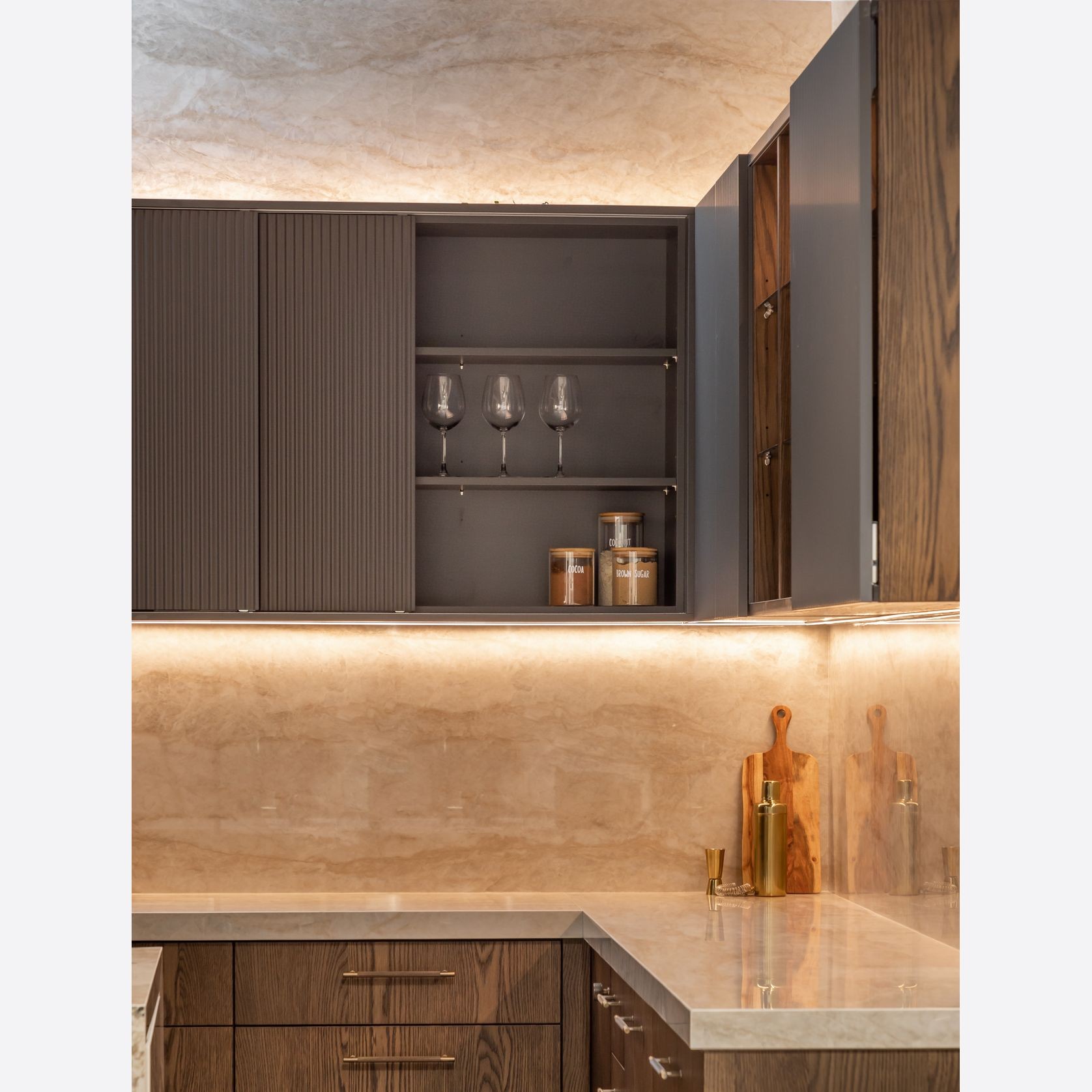 SlideLine M Inset in an overhead cabinet