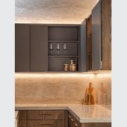 SlideLine M Inset in an overhead cabinet