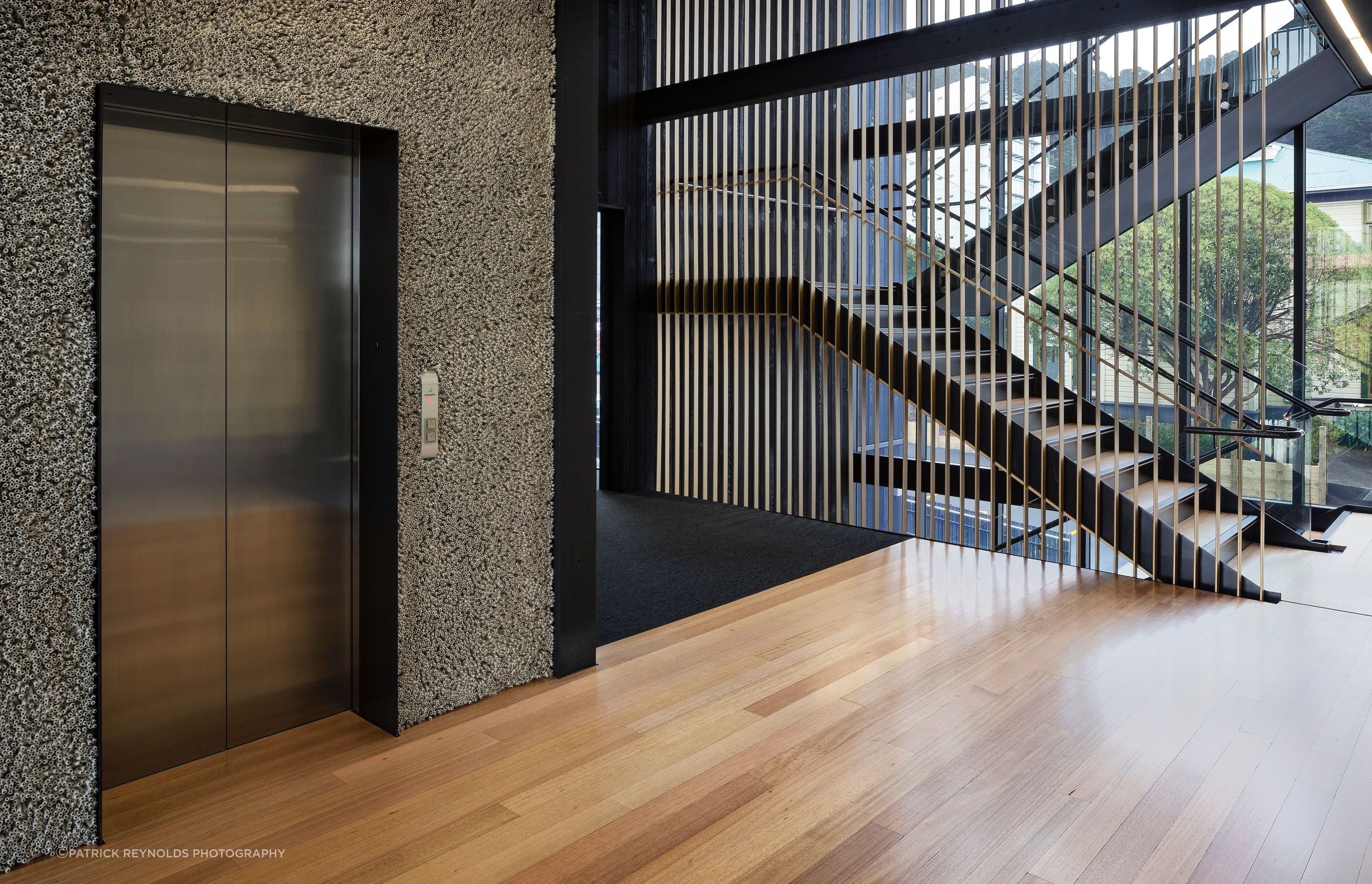 Nick Radford wool rugs applied to the lift frontage at the Royal Society of New Zealand.