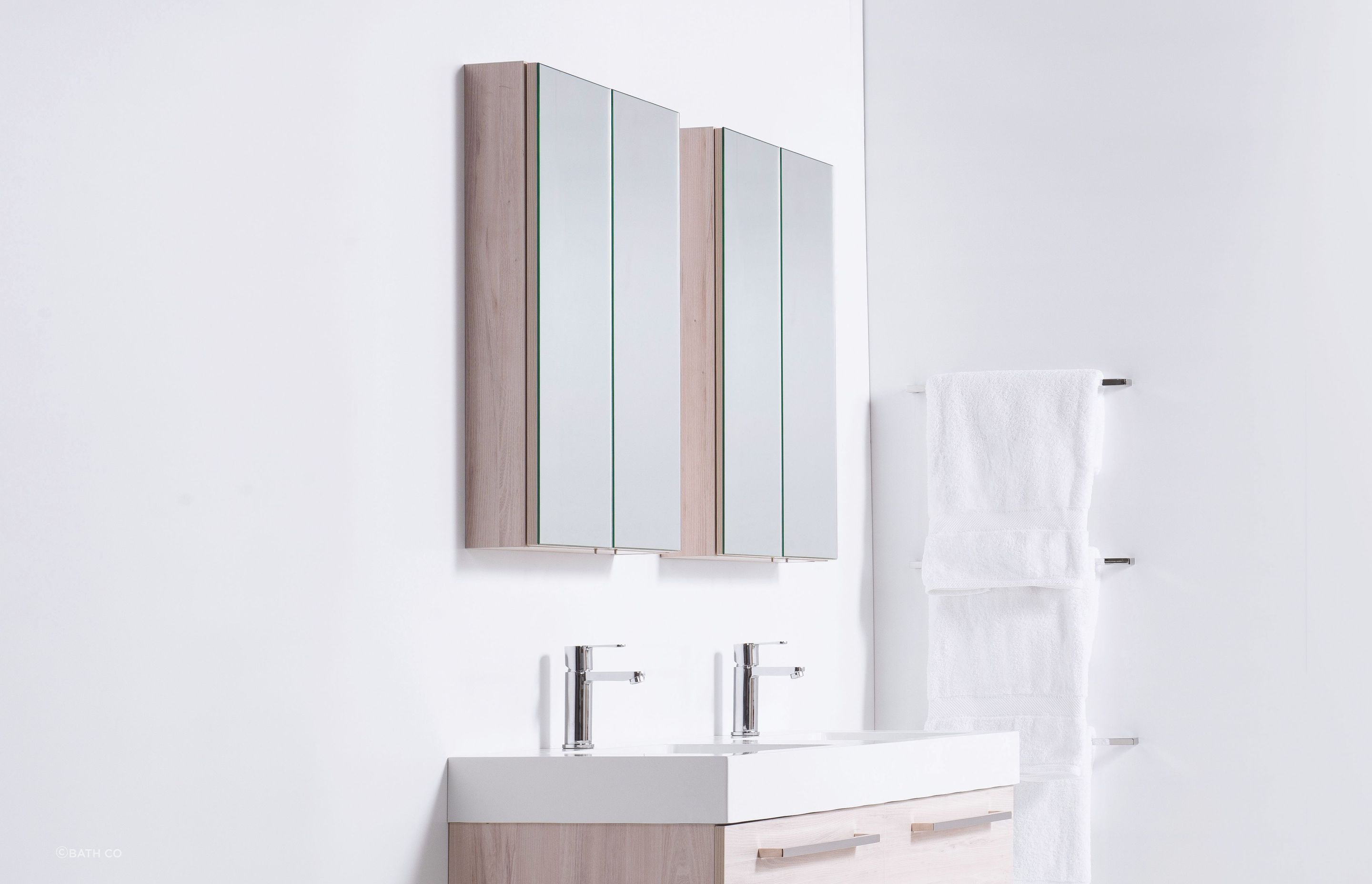 https://archipro.co.nz/images/cdn-images/width=3840,quality=80/images/s1/article/kitchen-and-bathroom/Bathroom-Mirror-Cabinets.jpg/eyJlZGl0cyI6W3sidHlwZSI6InpwY2YiLCJvcHRpb25zIjp7ImJveFdpZHRoIjoyODgwLCJib3hIZWlnaHQiOjE4NTYsIndhdGVybWFyayI6eyJ0ZXh0IjoiQmF0aCBDbyIsImZvbnRTaXplIjoyNH0sImNvdmVyIjp0cnVlLCJ6b29tV2lkdGgiOjI4ODAsInNjcm9sbFBvc1giOjUwLCJzY3JvbGxQb3NZIjo1MCwiYmFja2dyb3VuZCI6InJnYigyMjMsMjI0LDIyOSkiLCJmaWx0ZXIiOjB9fSx7InR5cGUiOiJmbGF0dGVuIiwib3B0aW9ucyI6eyJiYWNrZ3JvdW5kIjoiI2ZmZmZmZiJ9fV0sInF1YWxpdHkiOjg3LCJ0b0Zvcm1hdCI6ImpwZyJ9