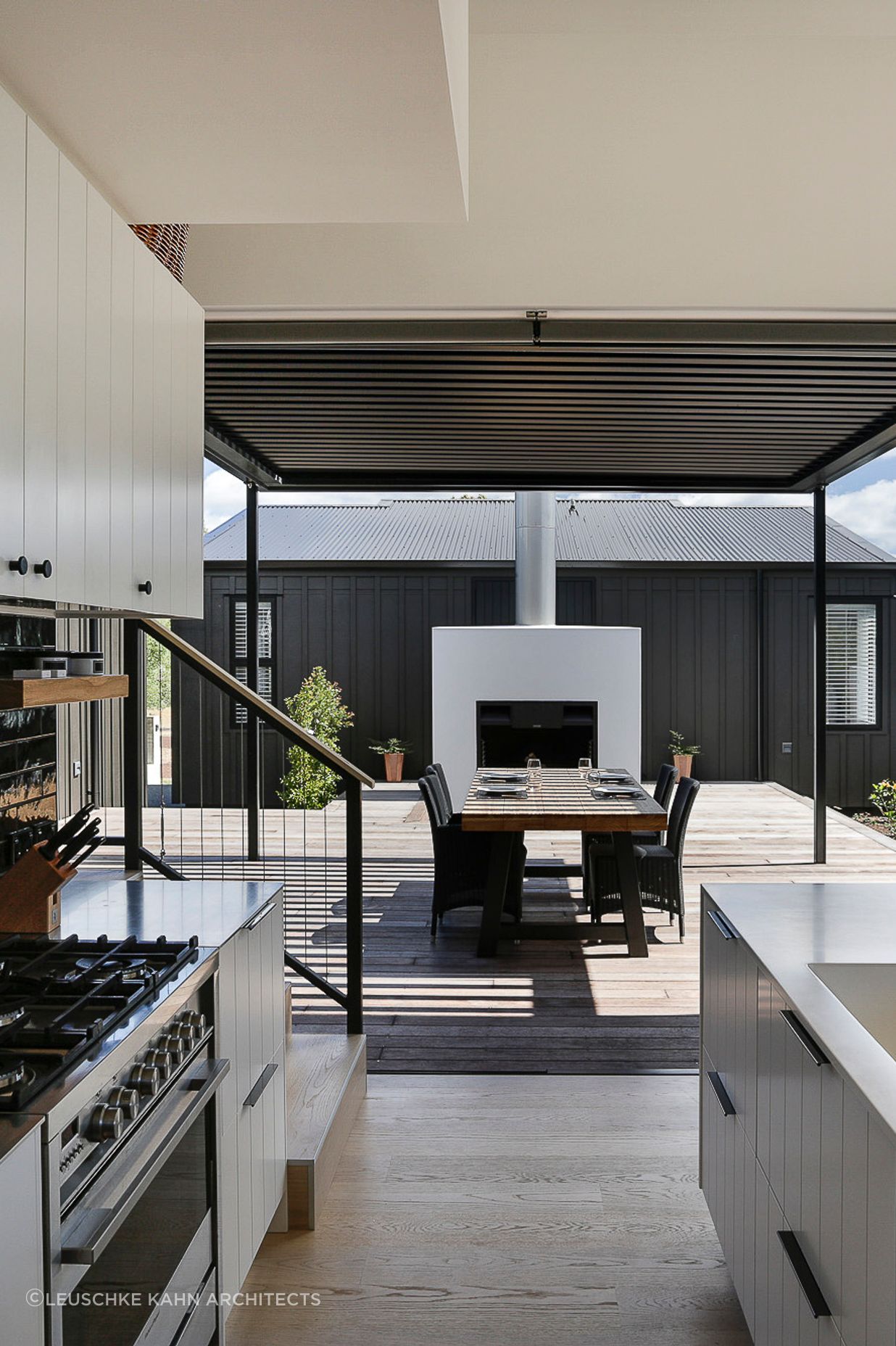 The addition of a louvre roof maximises indoor-outdoor flow from the kitchen and creates a welcoming outdoor space.
