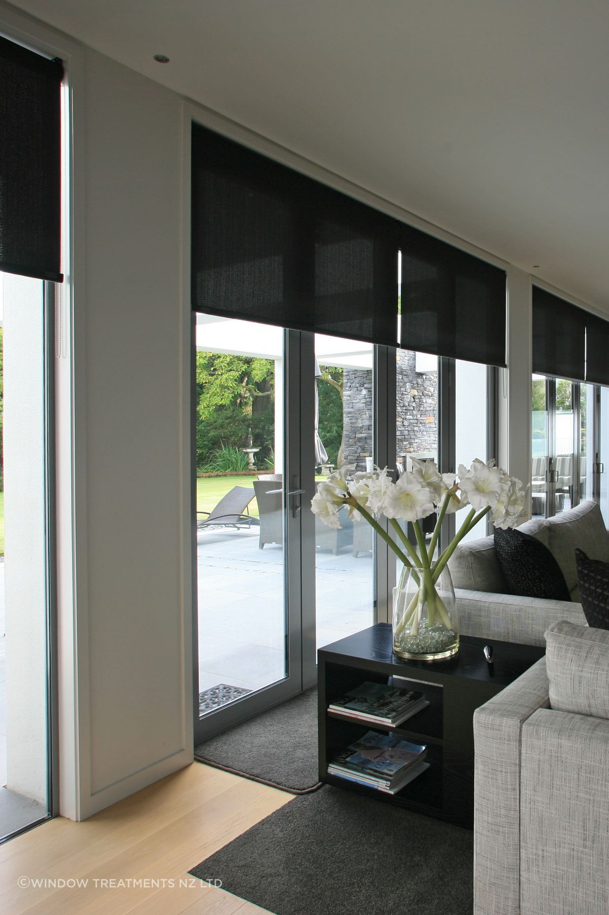 Sunscreen roller blinds are both sleek and functional.