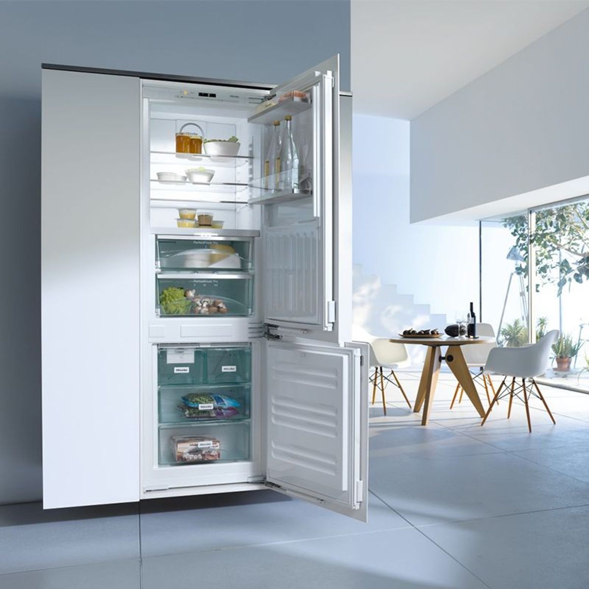 600 integrated best sale fridge freezer