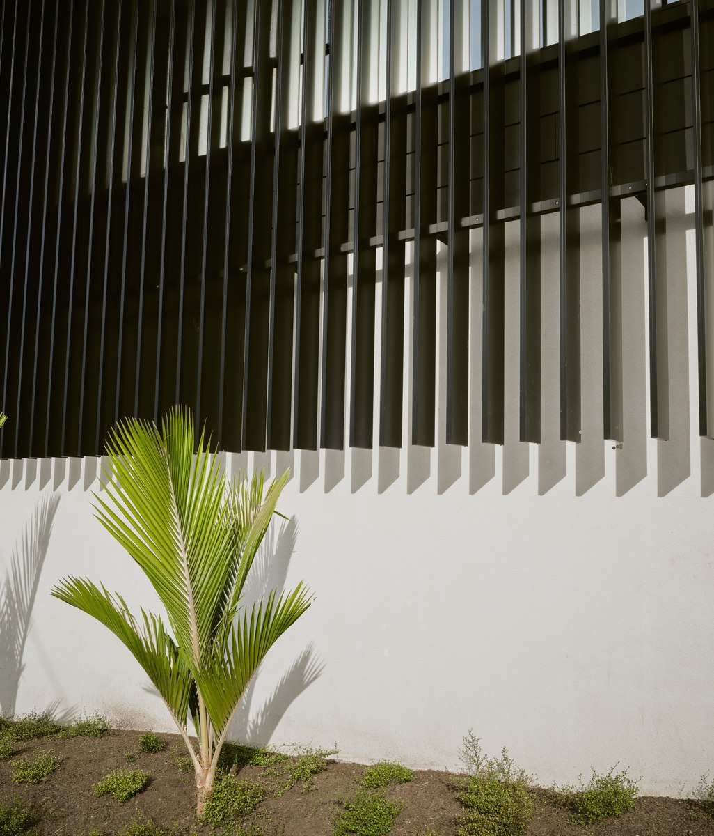 A new louvred facade transforms a 1970s commercial building