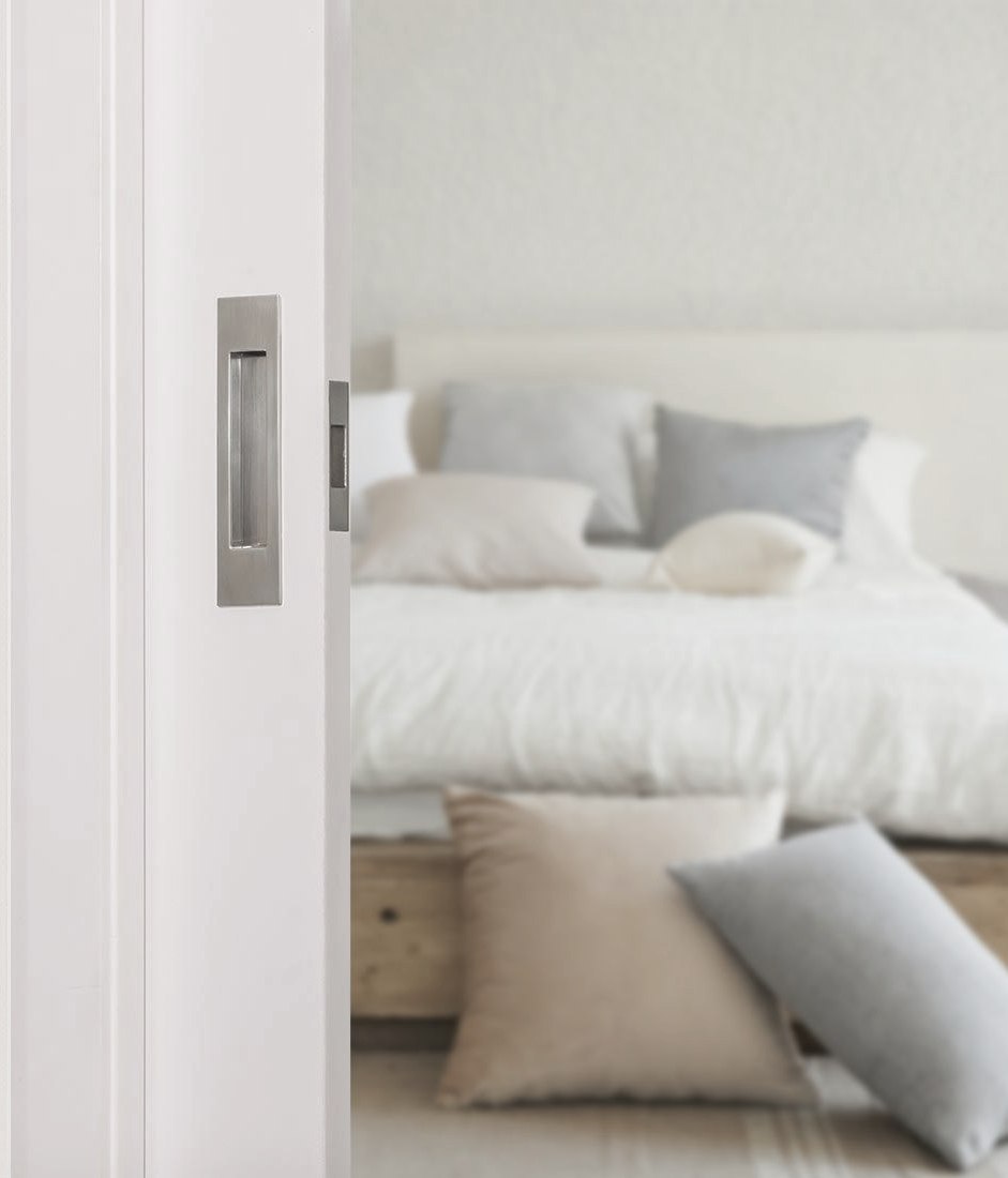 The key to sleek sliding doors is seamless and sophisticated hardware