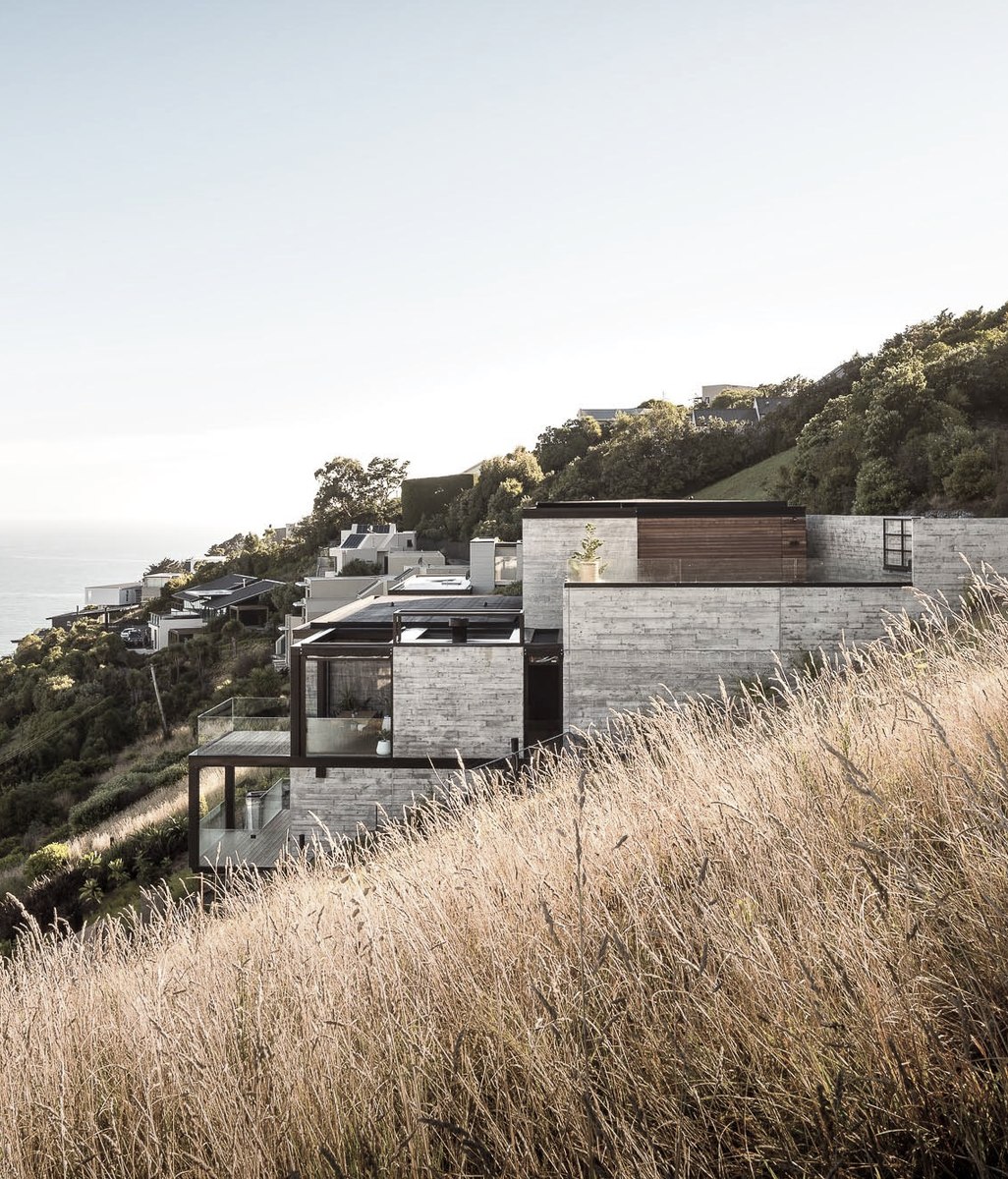 A dramatic in-situ concrete house on the side of a volcano