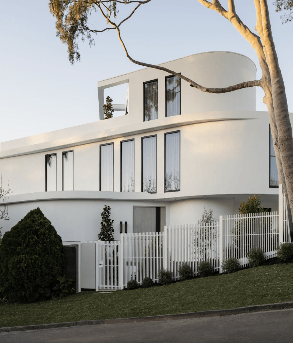 A house of unique curves, lights and shadows in upmarket Toorak