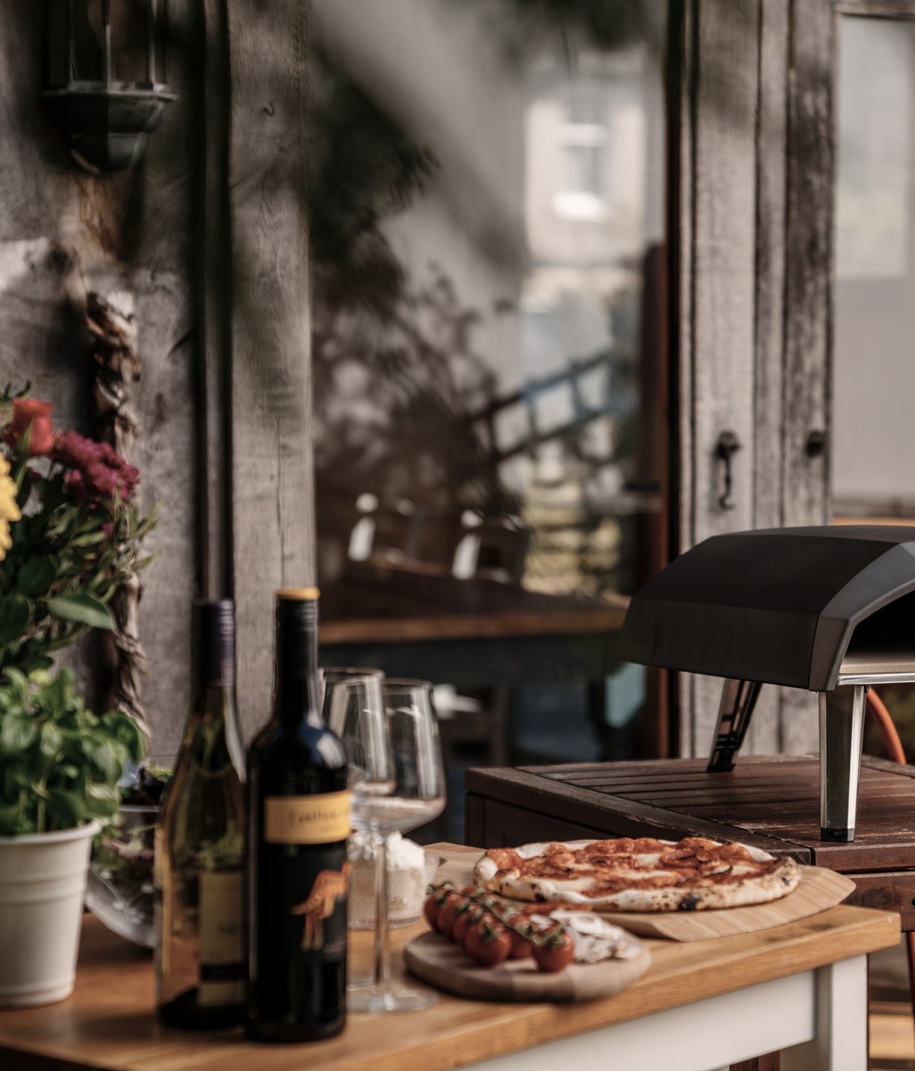 Relax, crack a beer, and enjoy an evening around the pizza oven