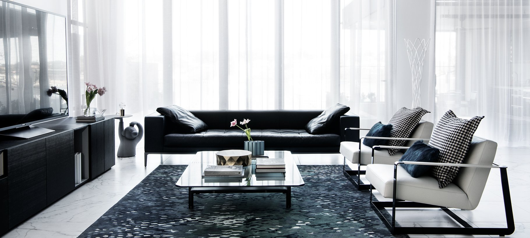 Rug up how to use rugs to define and delineate spaces