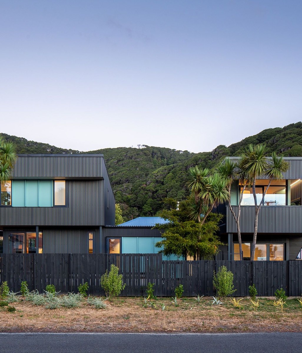 An innovative home and income on a sunny, tree-filled site