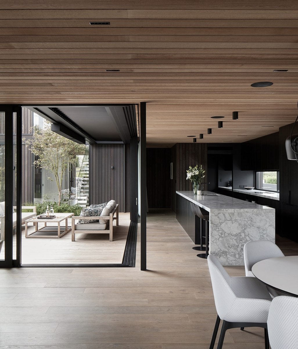Attention to detail delights in this cedar-clad home