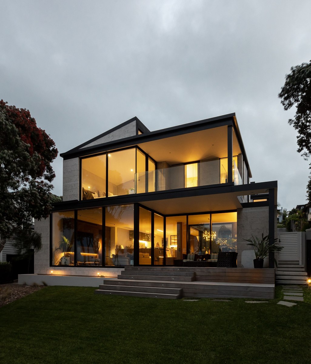 A clifftop residence inviting visitors down towards the sea