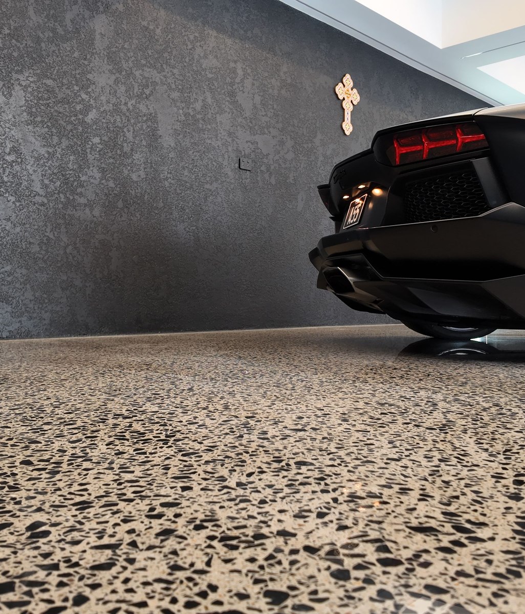 Transforming a prestigious Sydney garage into a luxury car showroom with polished concrete