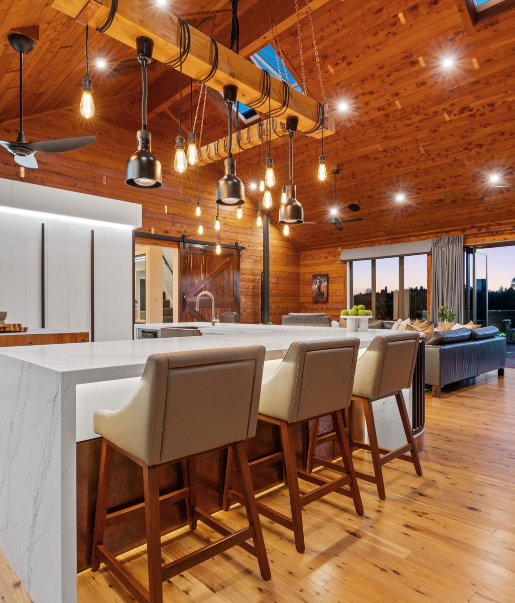 Macrocarpa timber stars in this award-winning 1184sqm lodge