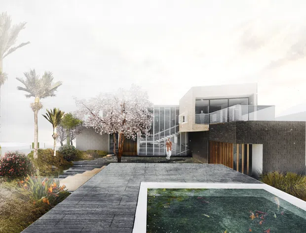 A contemporary multi-level residence viewed from the landscaped front approach, with a broad dark paved forecourt leading toward a glazed entry and upper-level balcony. The building combines a crisp white cubic volume with a darker textured facade and vertical timber-look screening. A rectangular reflecting pool or swimming pool occupies the foreground, surrounded by structured planting and palm trees.