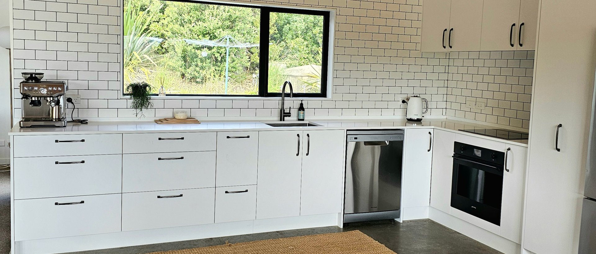 WHITE OPEN KITCHEN by Mangawhai Kitchens | ArchiPro NZ